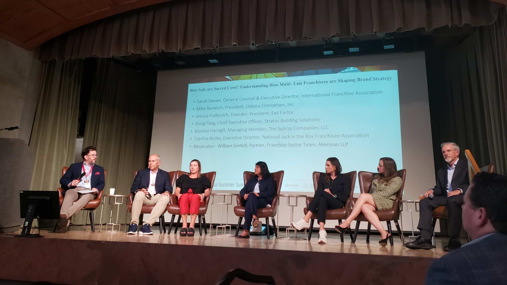 Monica on stage at the summit